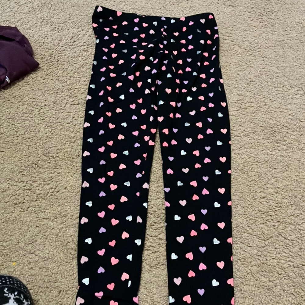 Black leggings with hearts